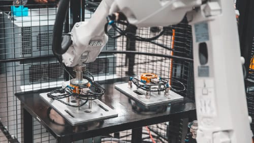 Machine guarding and safety fencing around industrial automation equipment